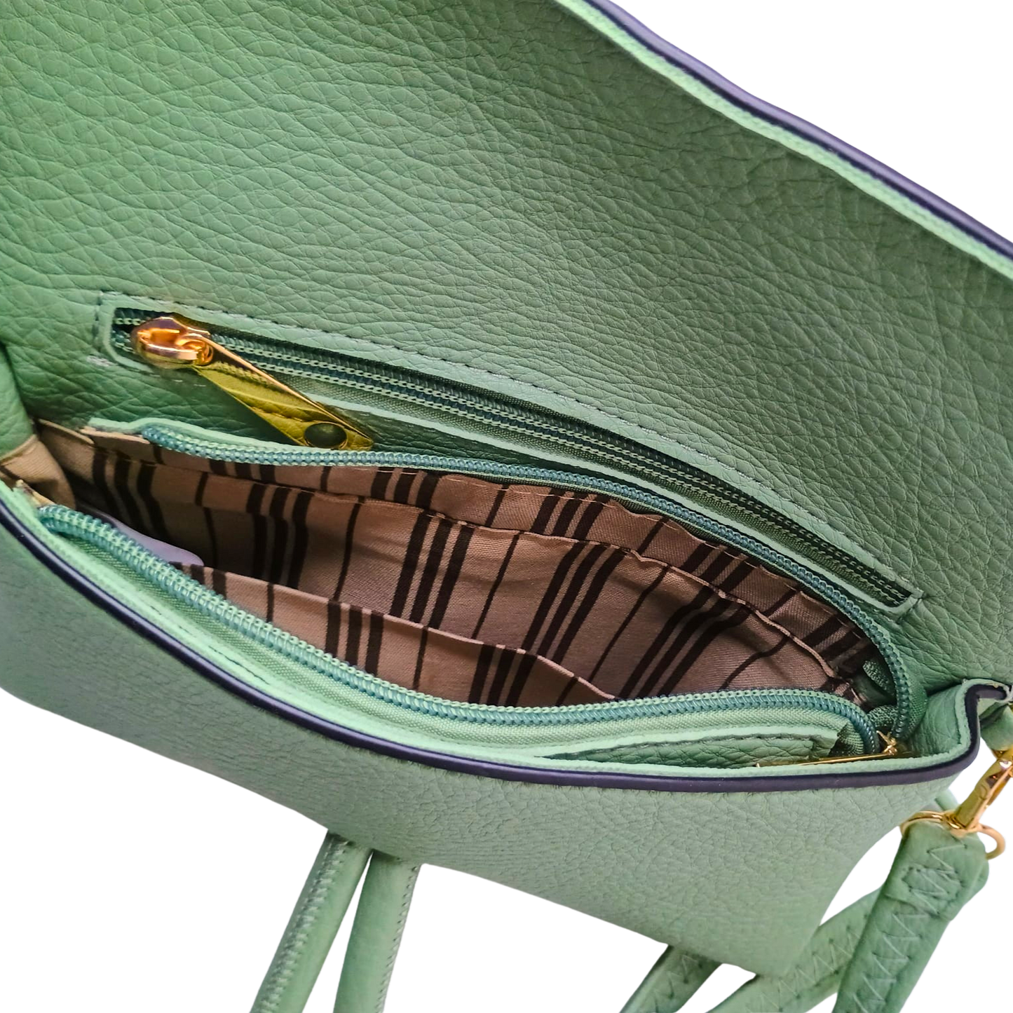 Green handbag with open zipper showing brown interior