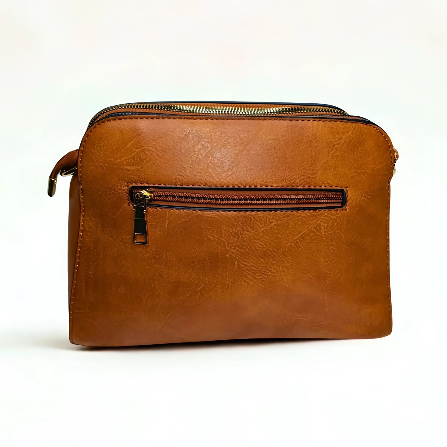 Brown leather bag with zippers on a white background