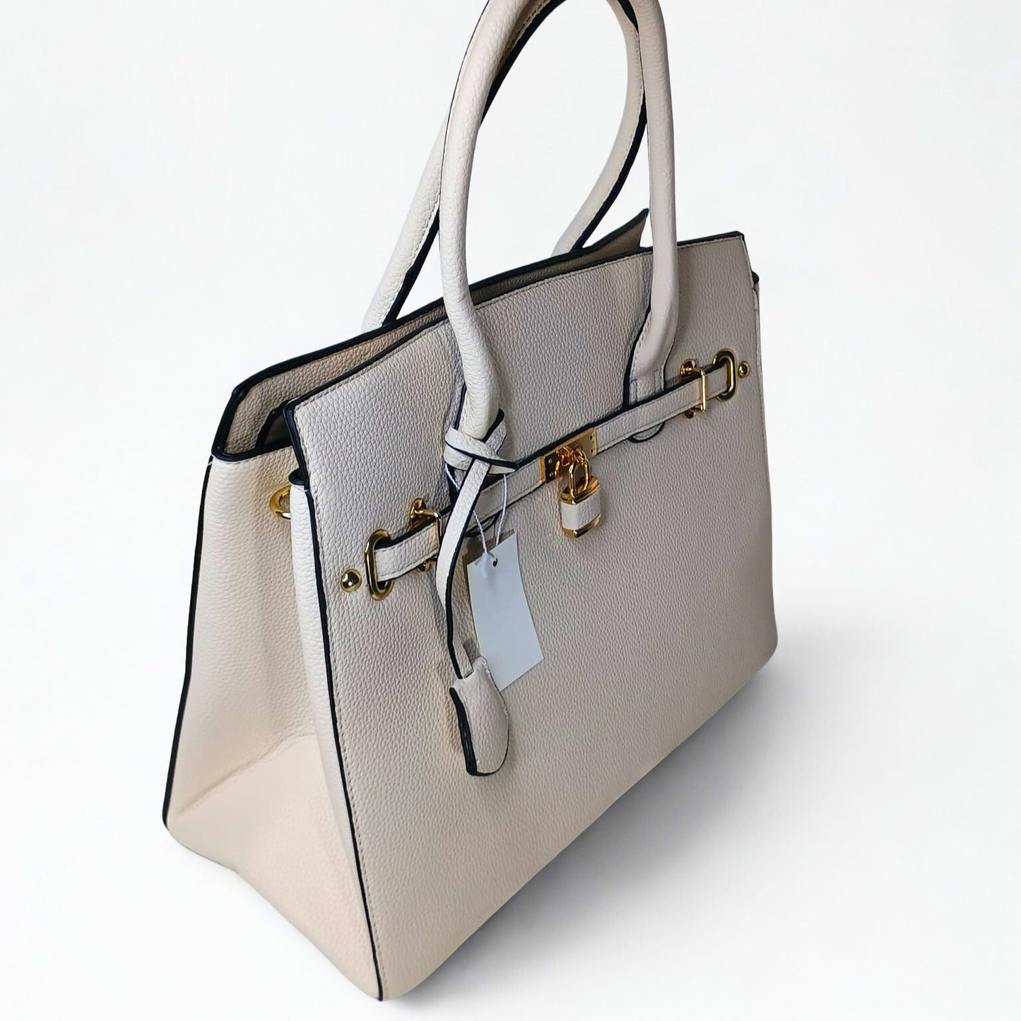 Beige handbag with gold accents on a white background