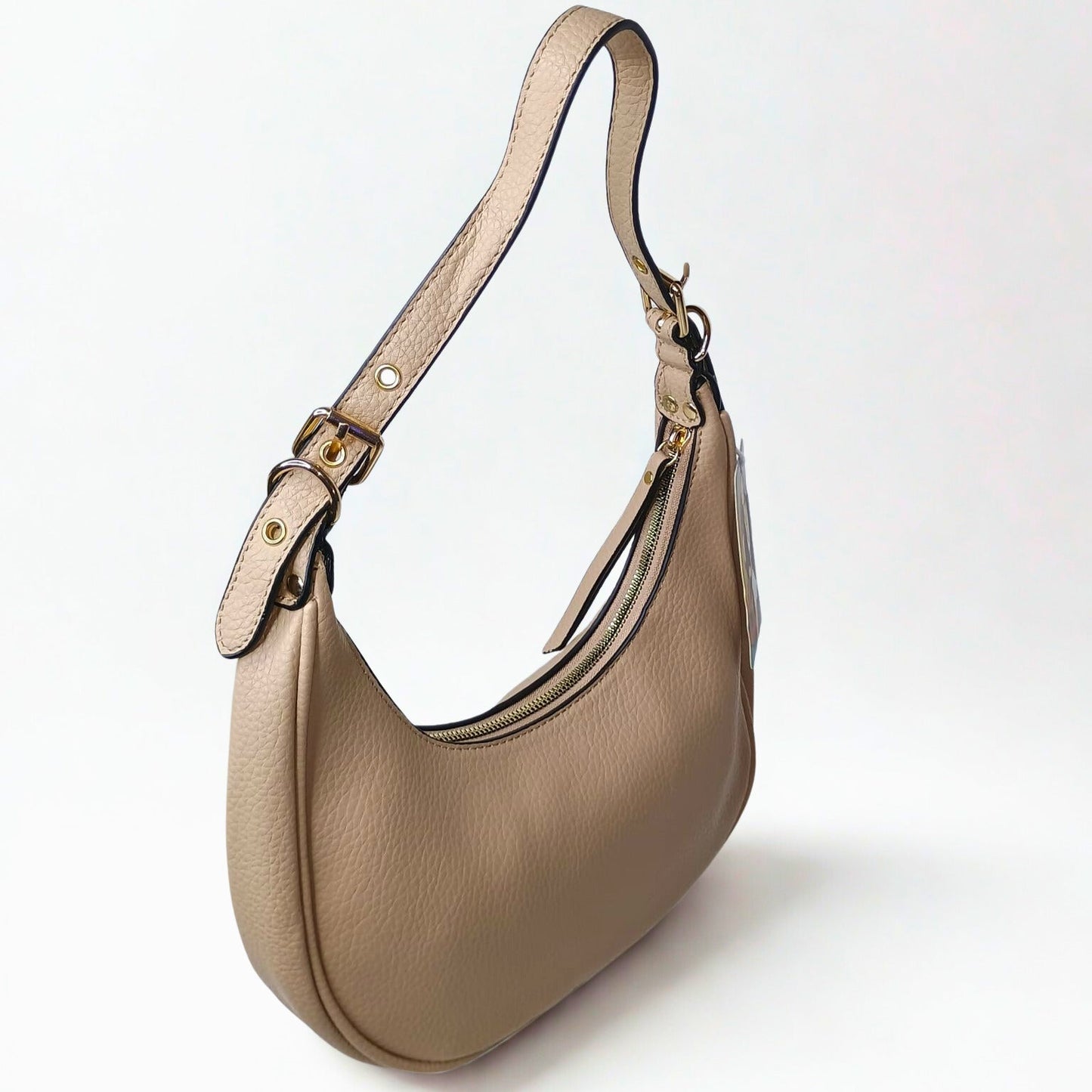 Beige handbag with a strap on a white background