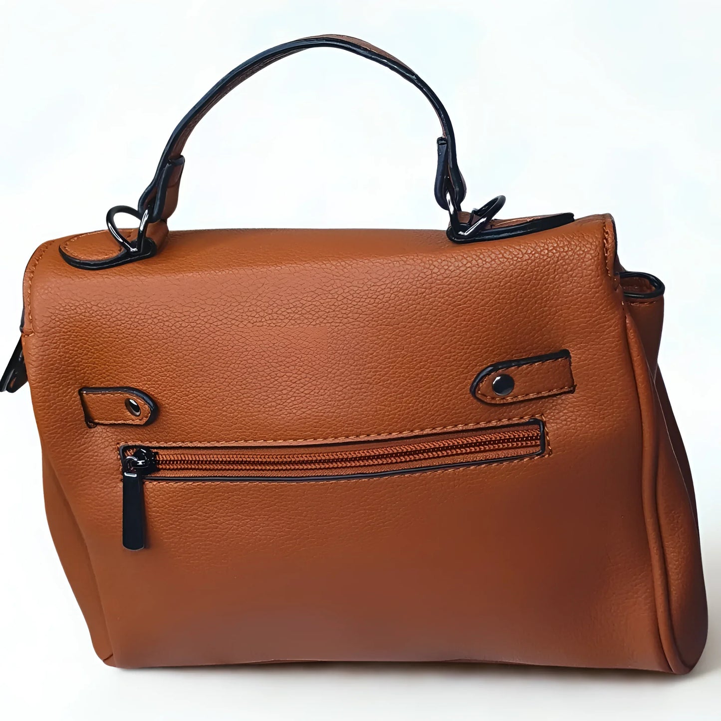 Brown leather handbag with a zipper on a white background
