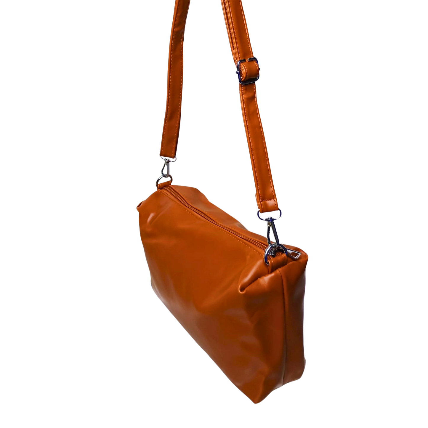 Brown leather handbag with a strap on a white background