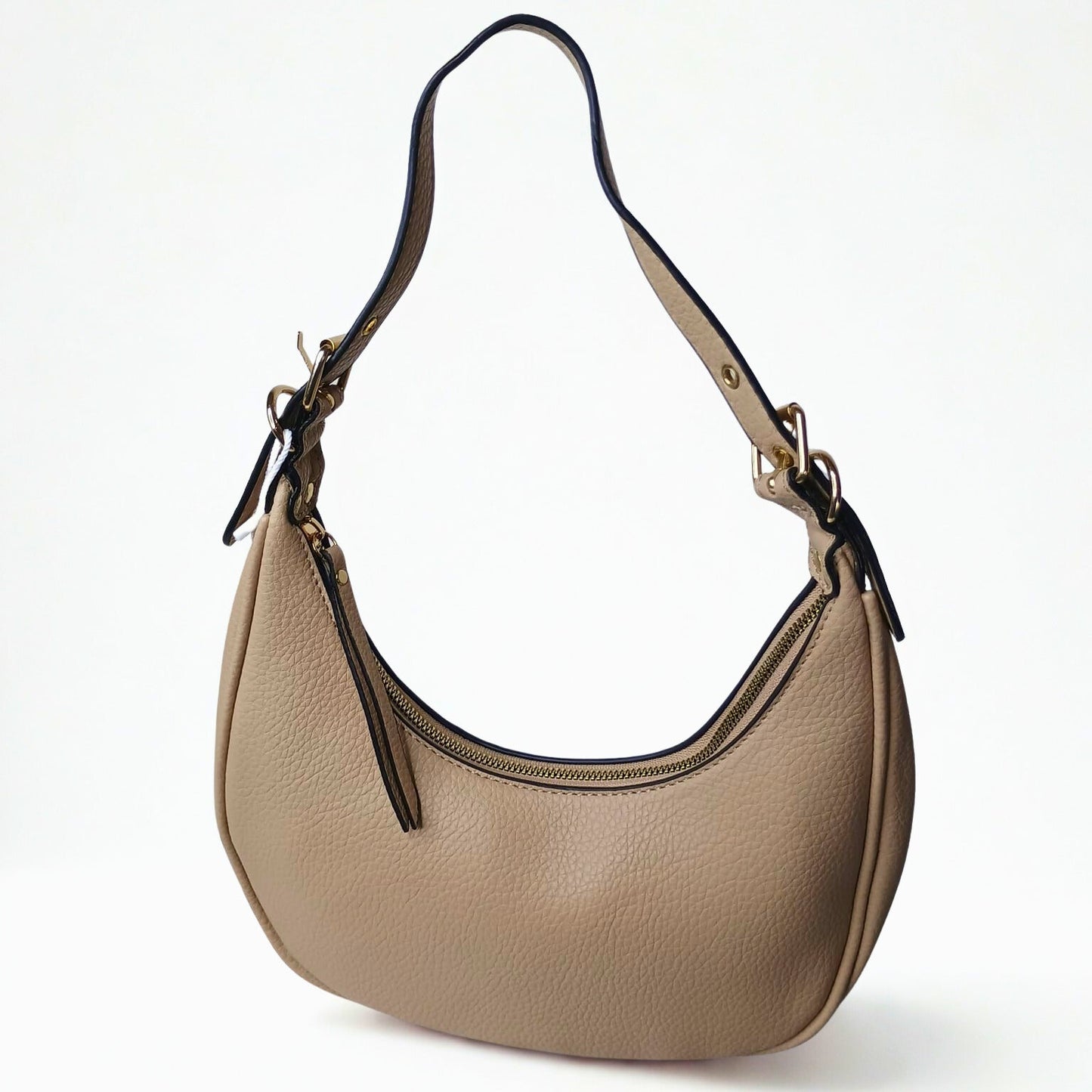 Beige handbag with black accents on a white background