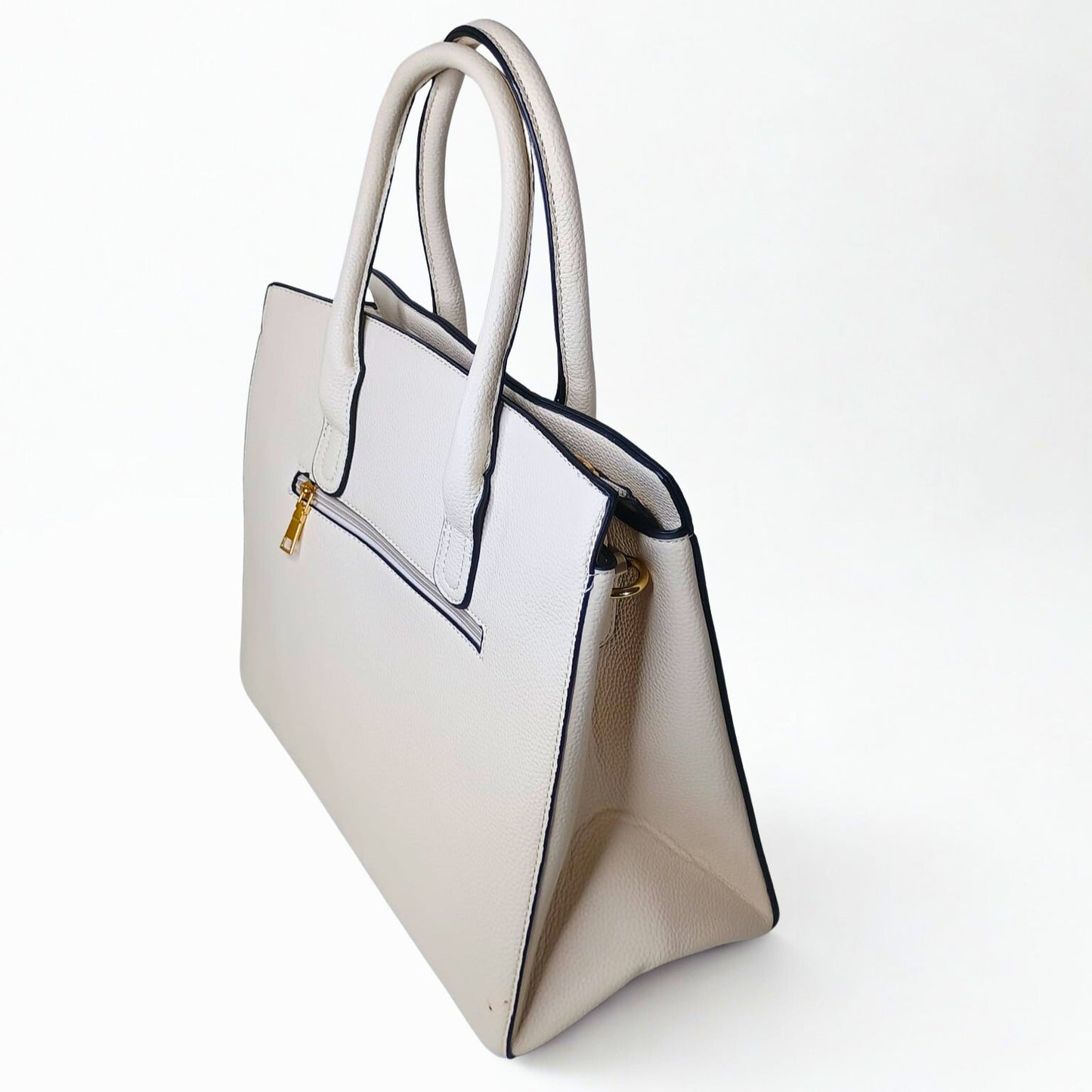 Beige handbag with a gold zipper on a white background