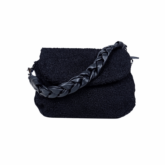 Black textured handbag with braided handle on a white background