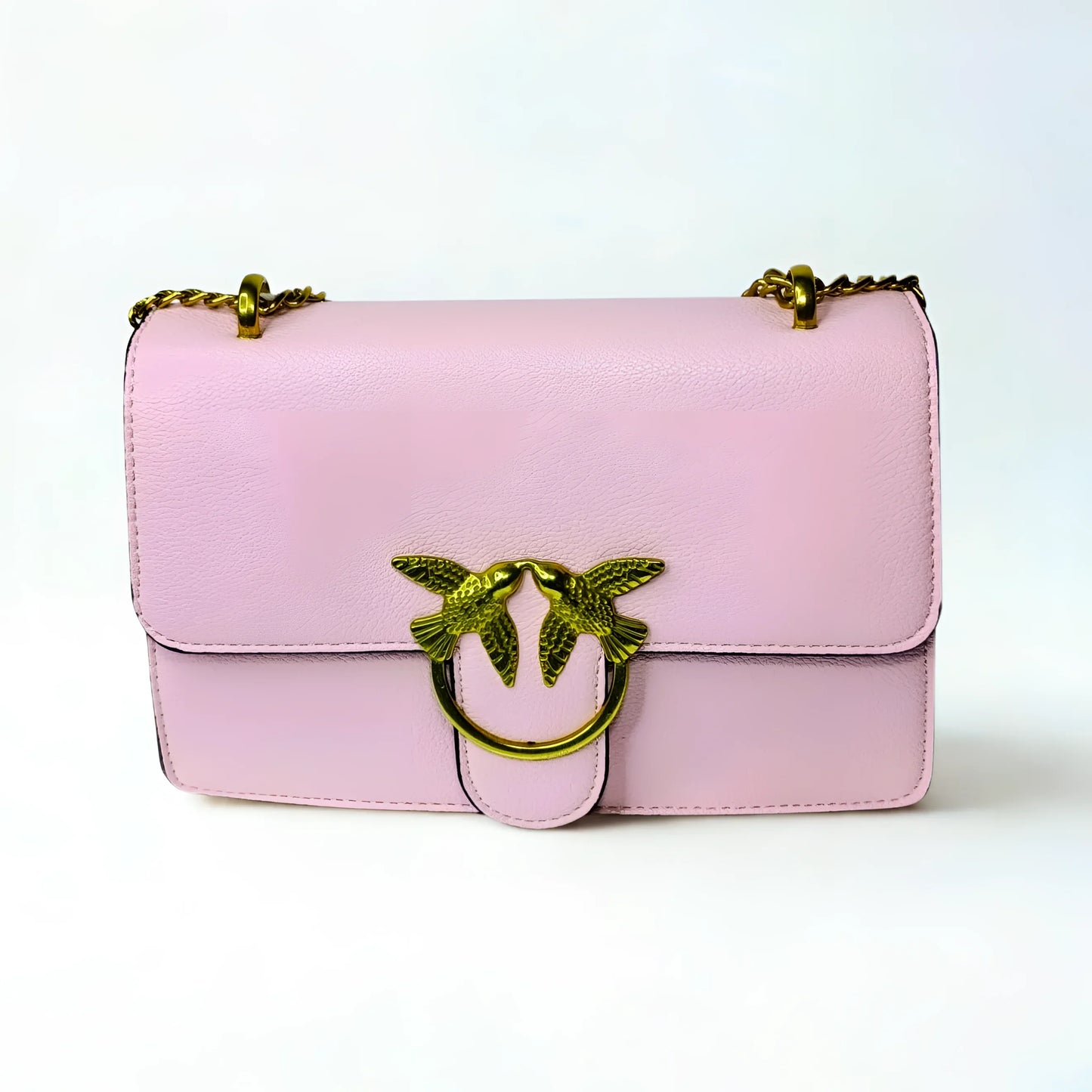 Pink handbag with gold chain and bird design on a white background