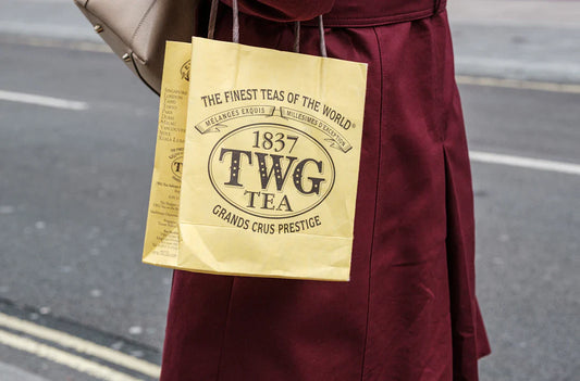 Borsa a secchiello in pelle gialla con logo Twg Tea 1837