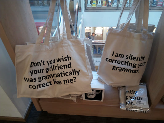 A couple of bags with some writing on them