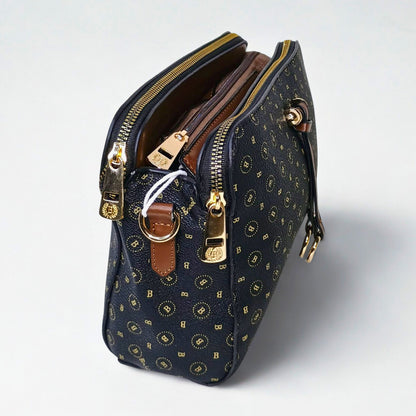 Navy blue handbag with gold accents on a white background