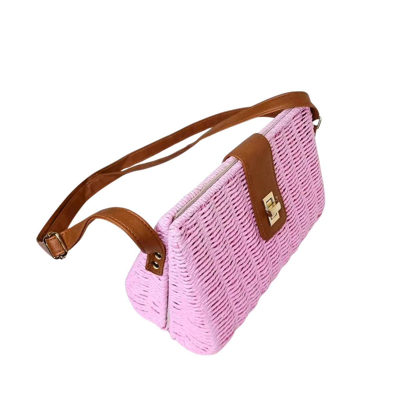 Pink woven handbag with brown strap and accents on a white background