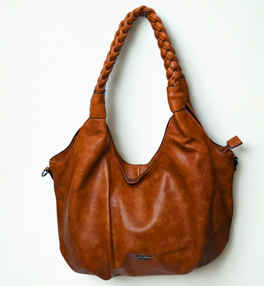 Brown leather handbag with braided handle on a white background