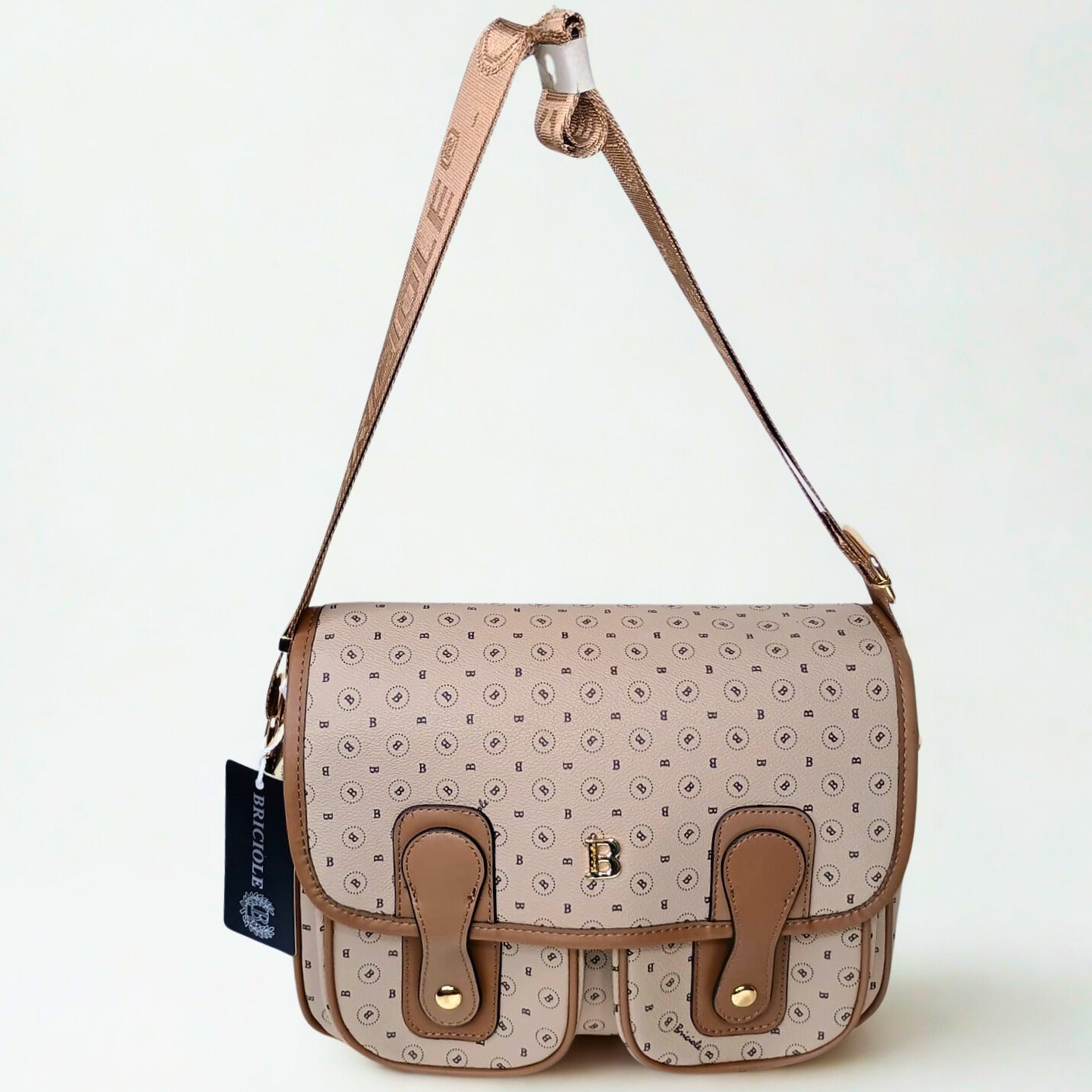 Patterned handbag with brown accents on a white background
