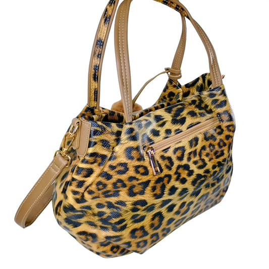 Leopard print handbag with beige accents on a white background