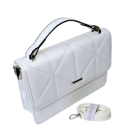 White quilted handbag with a matching strap on a white background
