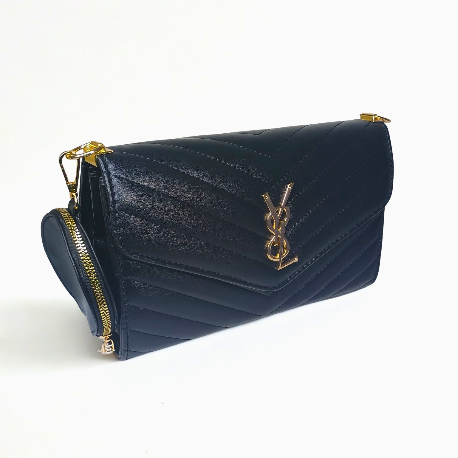 Navy blue handbag with gold accents on a white background
