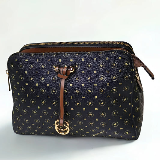 Navy blue handbag with gold pattern and brown leather accents on a white background