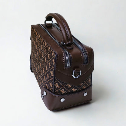 Brown leather handbag with a pattern on a white background