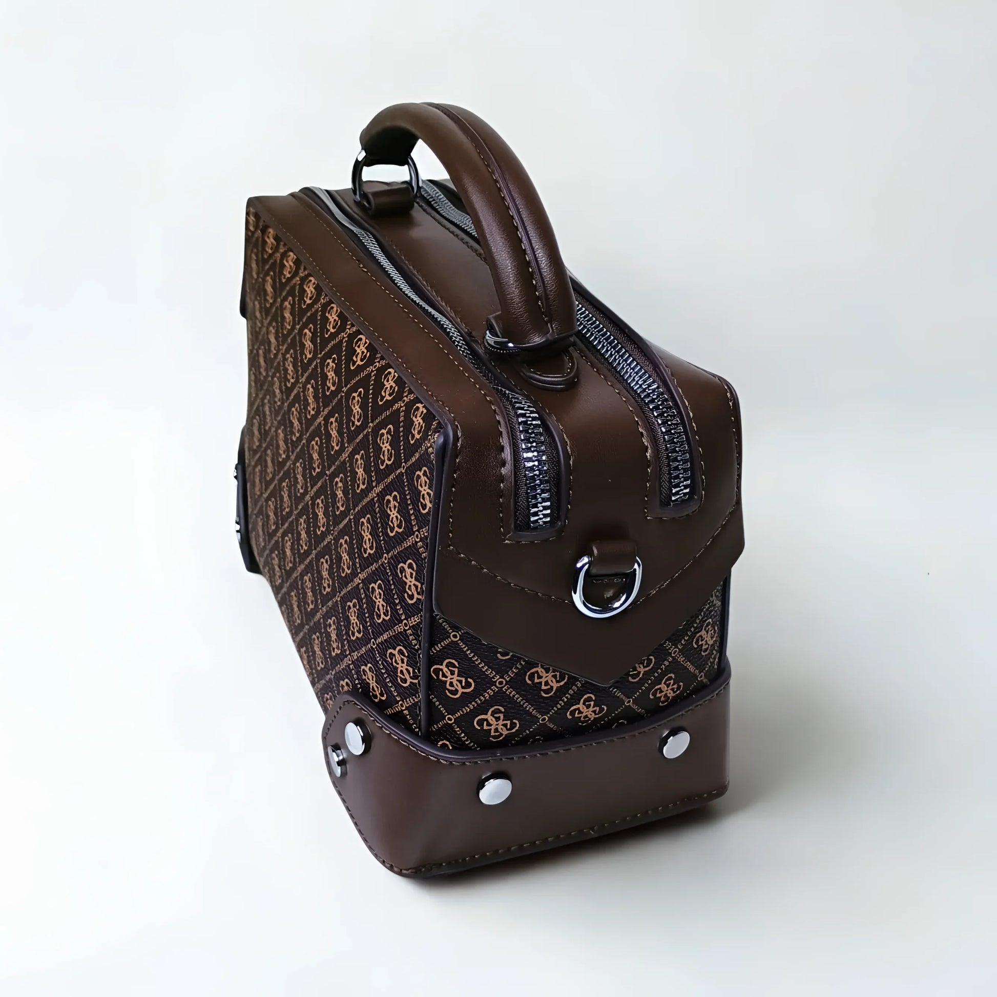 Brown leather handbag with a pattern on a white background