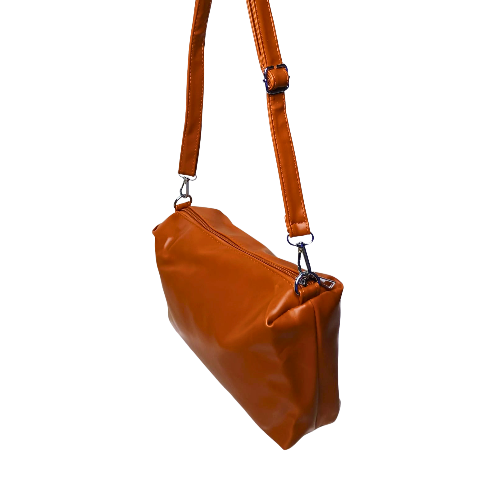 Brown leather handbag with a strap on a white background