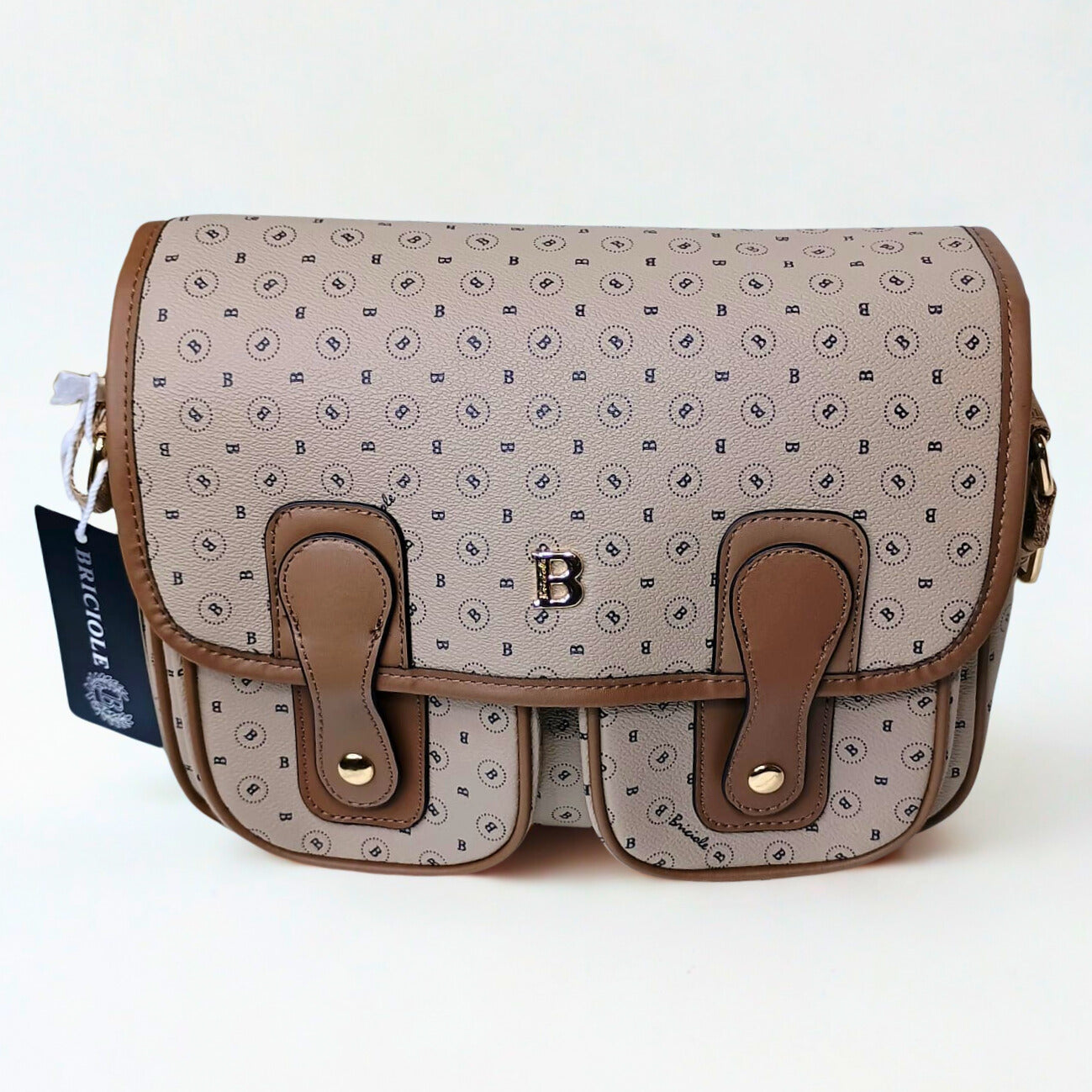 Patterned handbag with brown accents on a white background