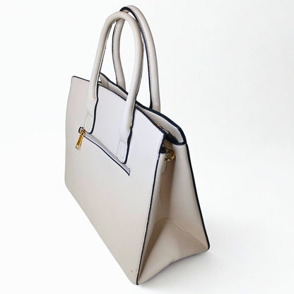 Beige handbag with a gold zipper on a white background