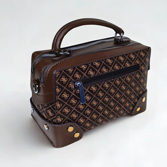 Brown handbag with a pattern on a white background