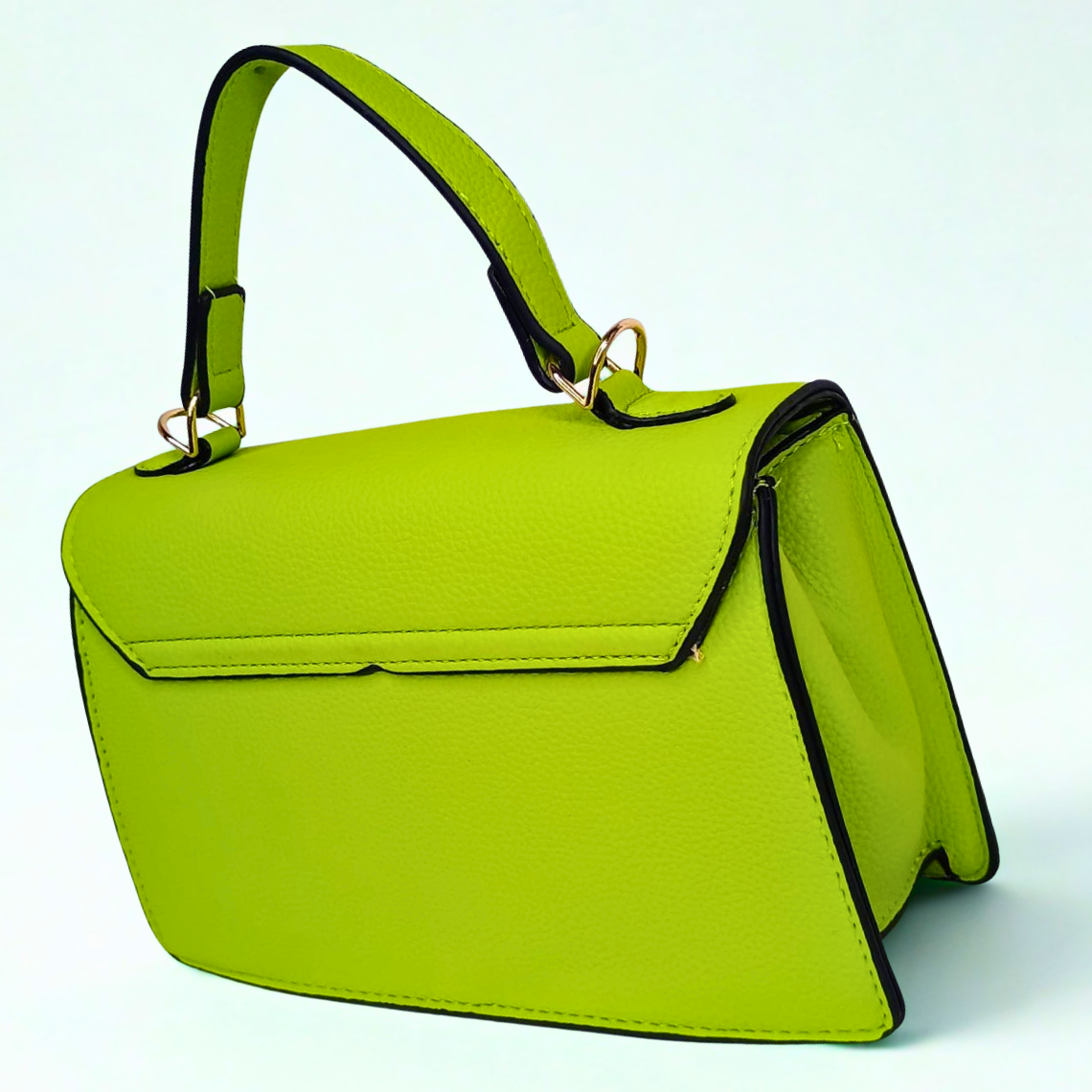 Green handbag with black accents on a light blue background