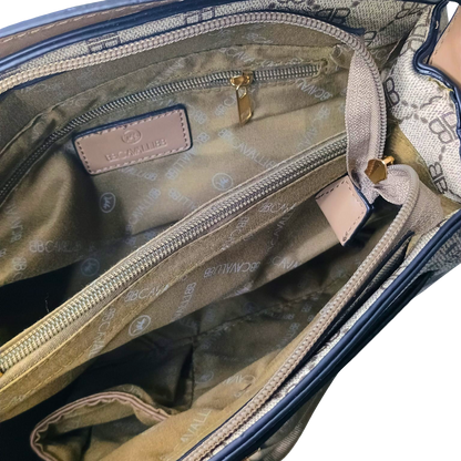 Open handbag revealing a patterned interior with visible brand name.