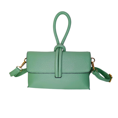 Green handbag with a knot detail on a white background