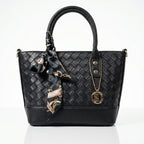 front of a leather bag