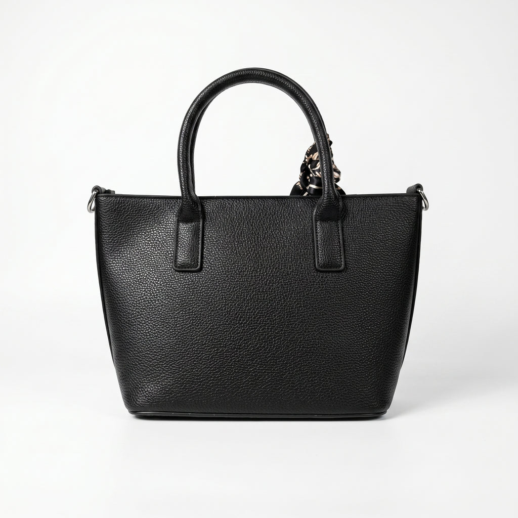 Black handbag on a white background