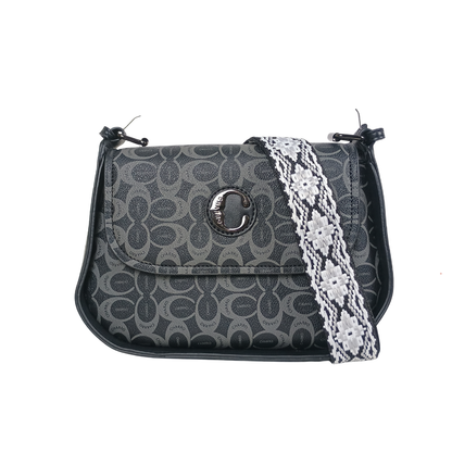 Gray patterned handbag with a white lace strap on a white background