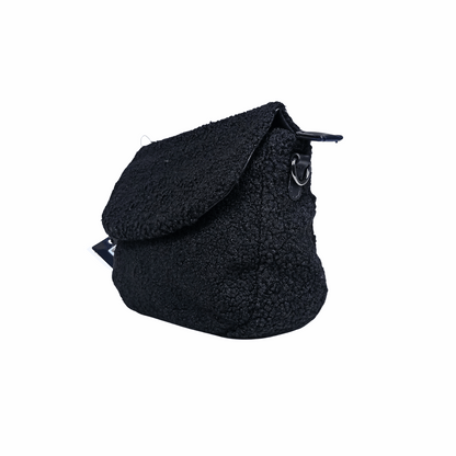 Black textured bag on a white background