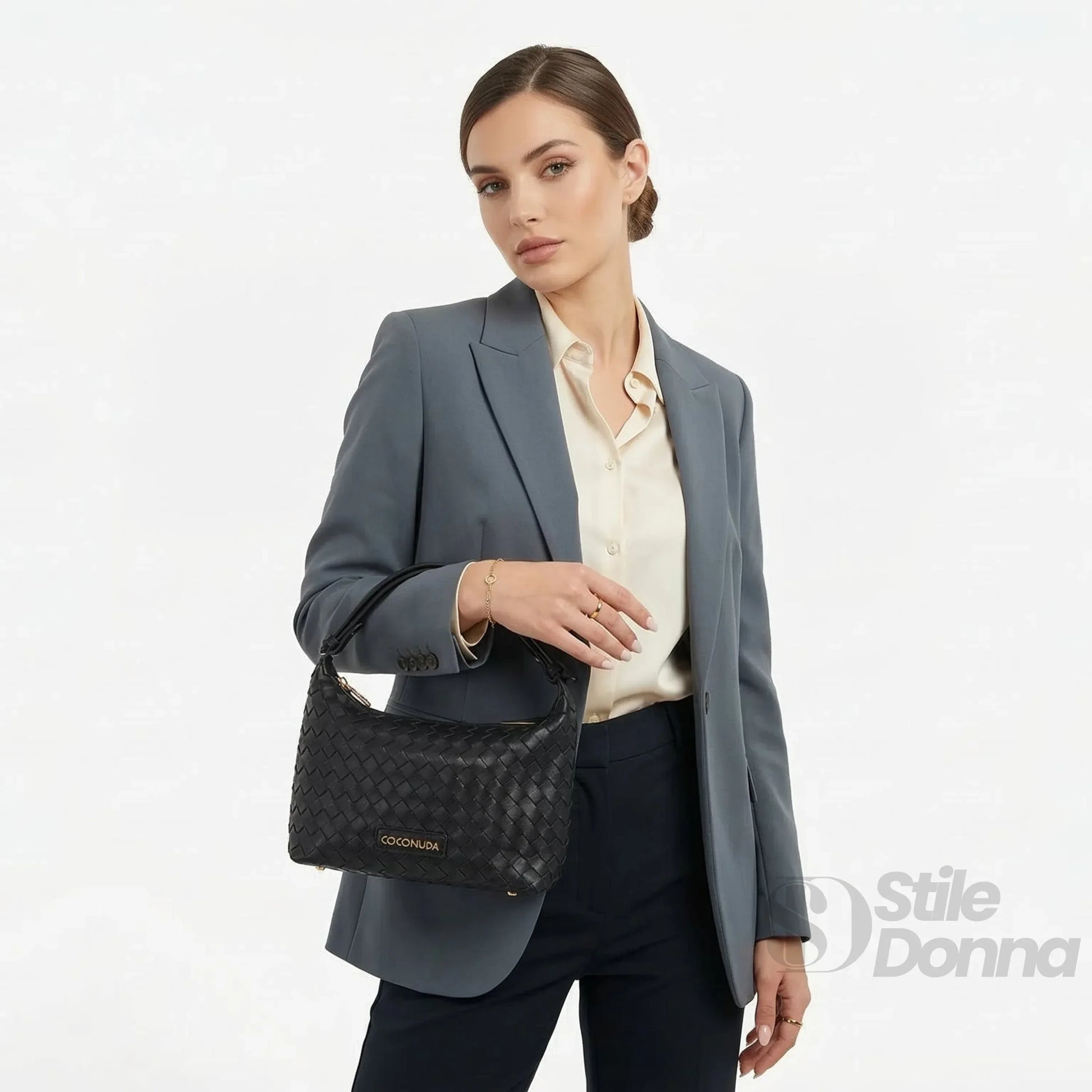 Coconuda borsa intrecciata ecopelle nera con manico hobo – vista laterale