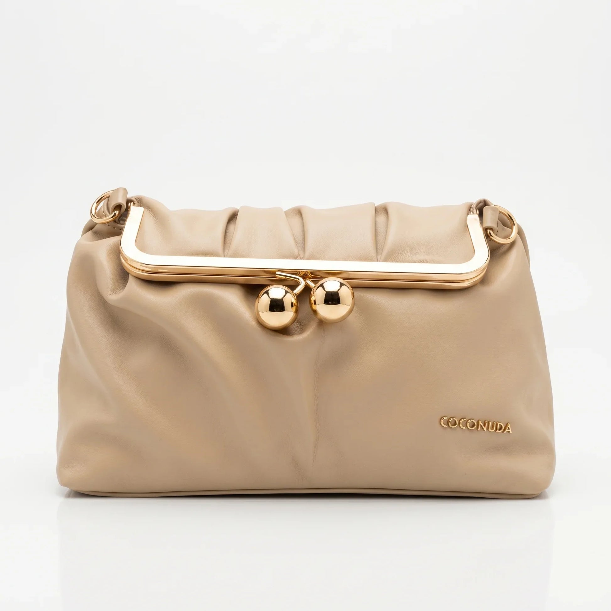 Coconuda pochette ecopelle morbida blu con chiusura a scatto – vista laterale