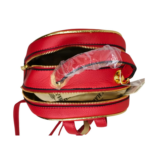 Red leather bag with gold zipper and strap on a white background