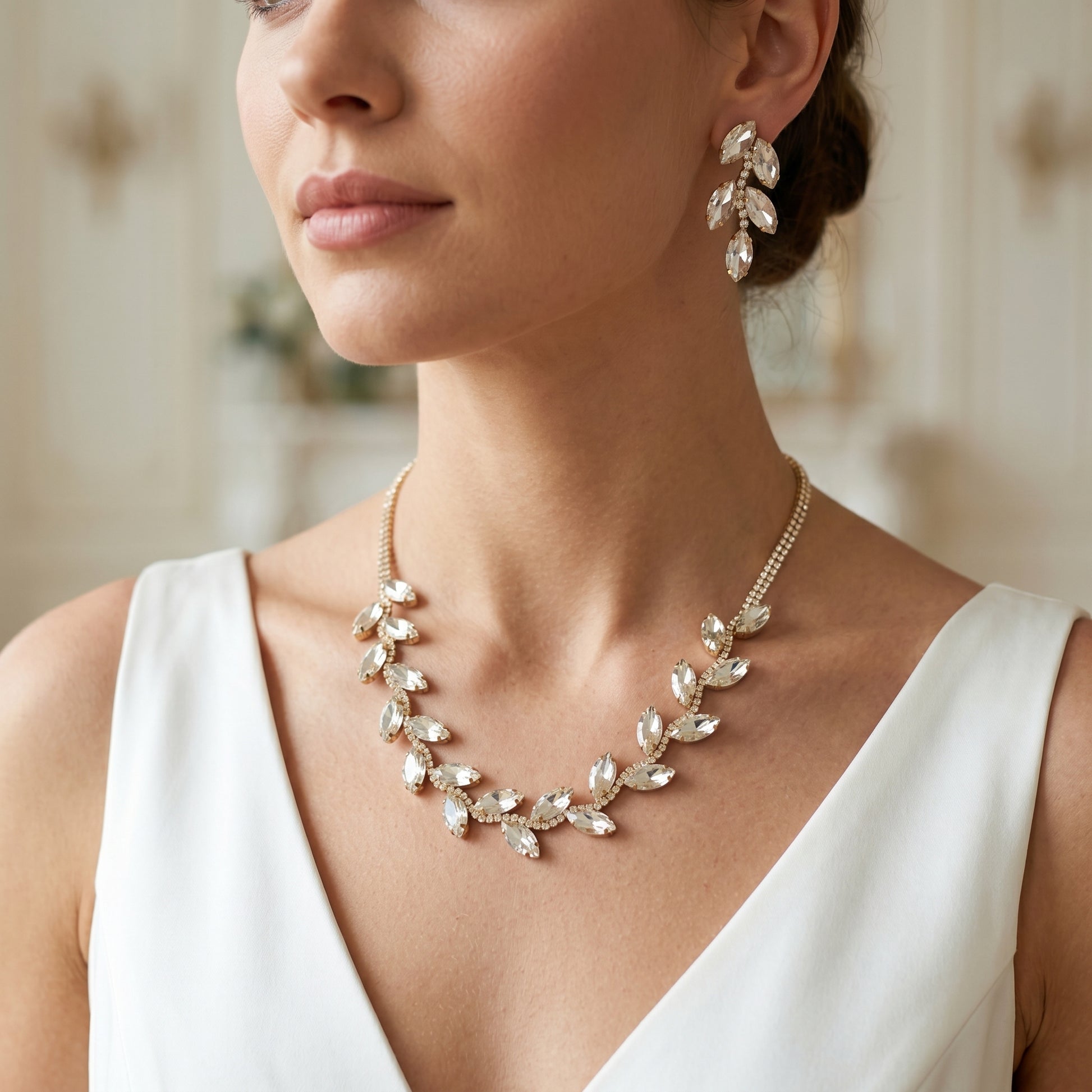 Set Collana e Orecchini Foglia d'Oro Cristalli Brillanti | Vista frontale | Oro