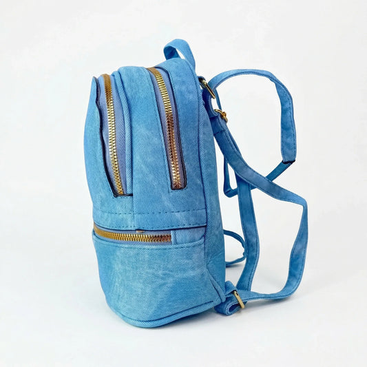 Zaino Mini Denim Blu Con Zip Oro | Vista laterale | denim | Blu