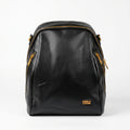 Black leather backpack with gold zippers on a white background