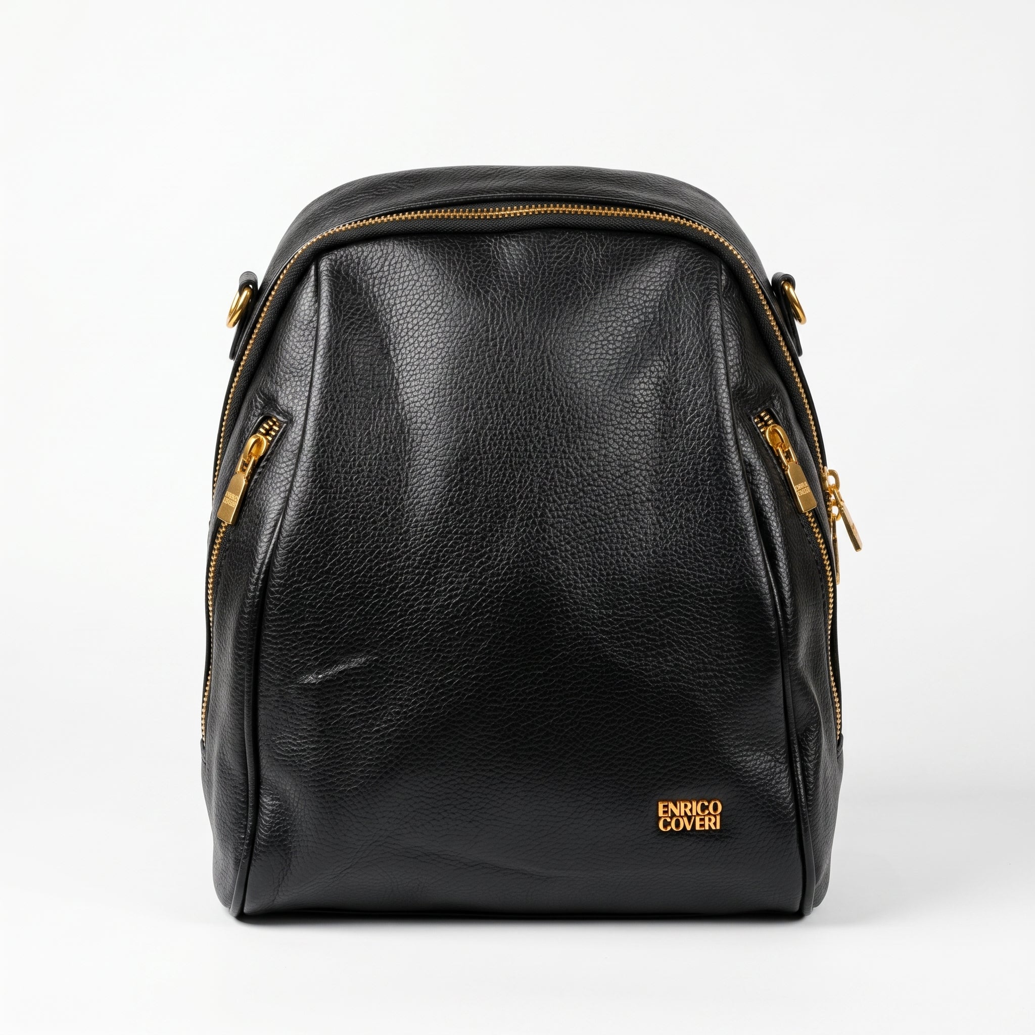 Black leather backpack with gold zippers on a white background