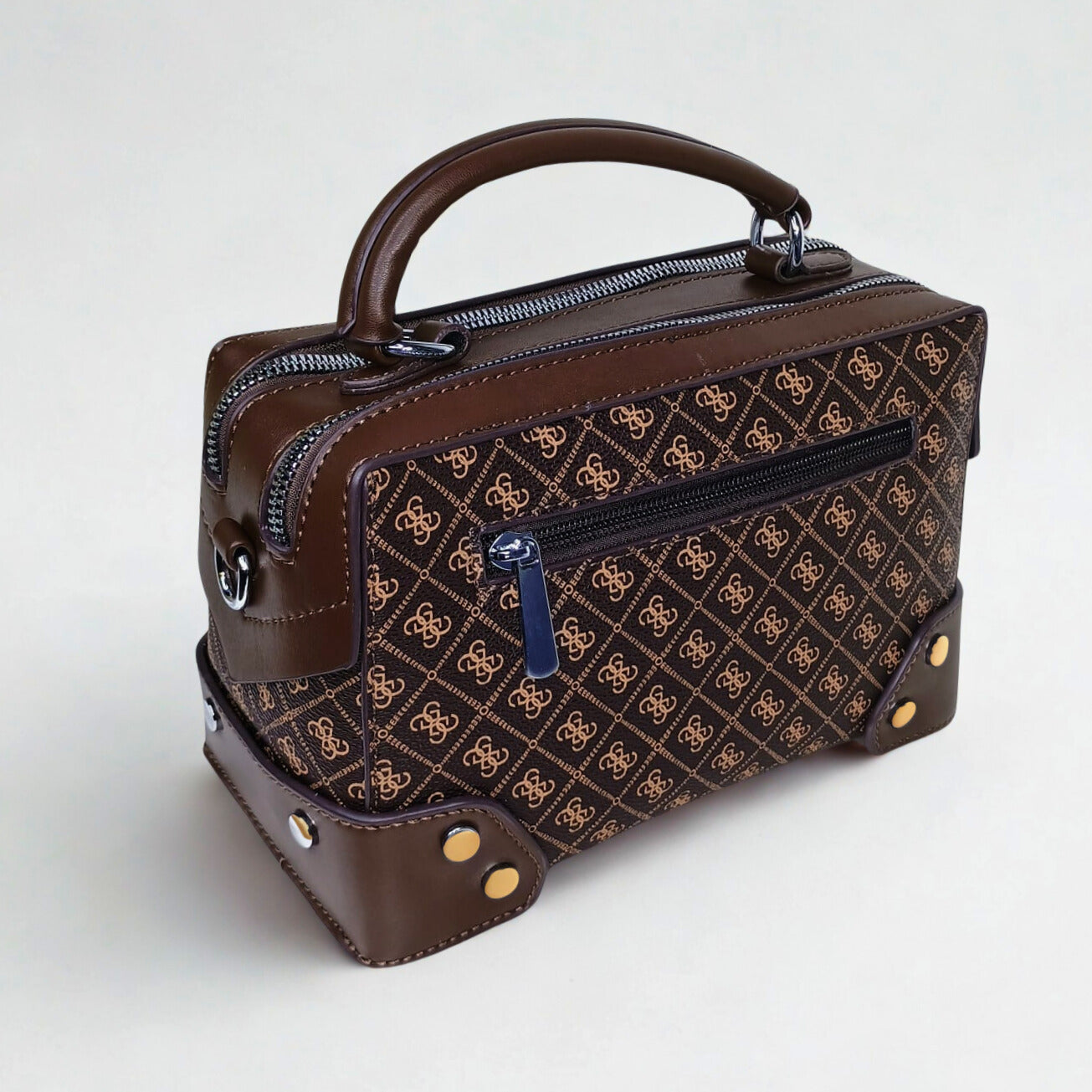 Brown handbag with a pattern on a white background