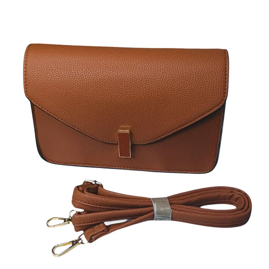 Brown leather handbag with matching strap on a white background