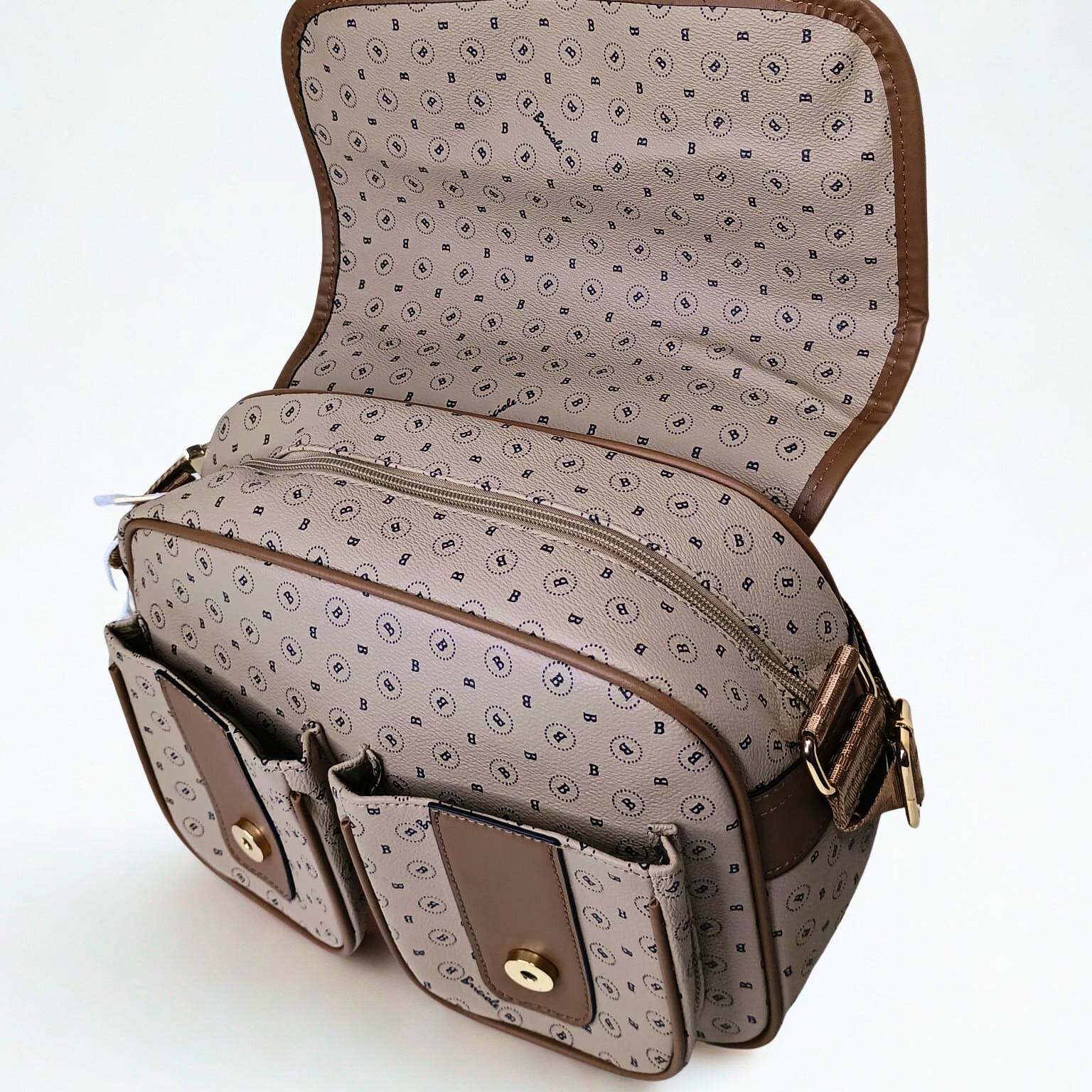 Open handbag with patterned interior on a white background