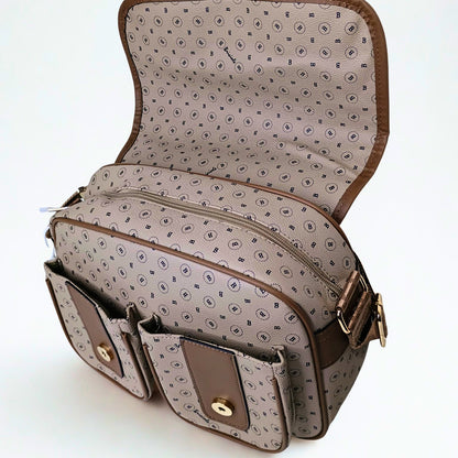 Open handbag with patterned interior on a white background