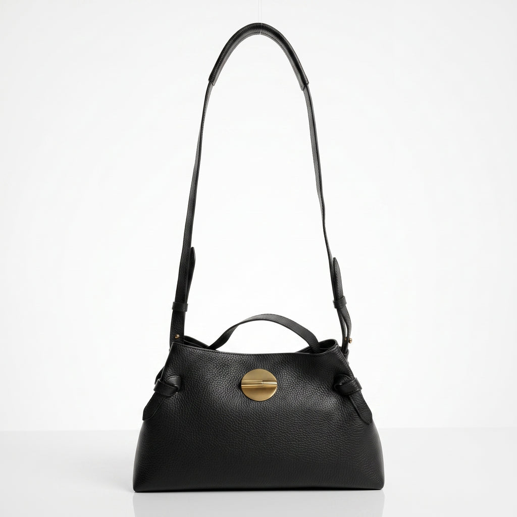 Livia Tasche aus echtem, genarbtem schwarzem Leder mit Malachit-Scheibenverschluss