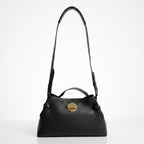 Livia Tasche aus echtem, genarbtem schwarzem Leder mit Malachit-Scheibenverschluss