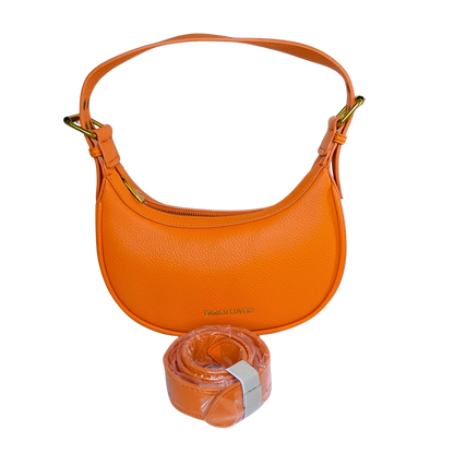 Orange handbag with matching belt on a white background