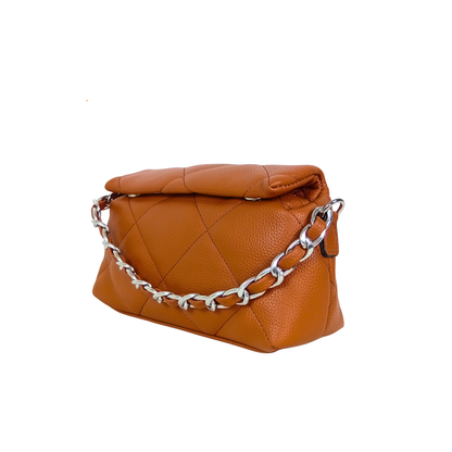 Brown quilted handbag with a silver chain on a white background