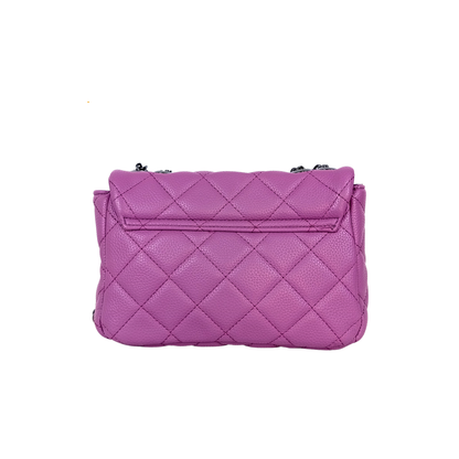Purple quilted handbag on a white background