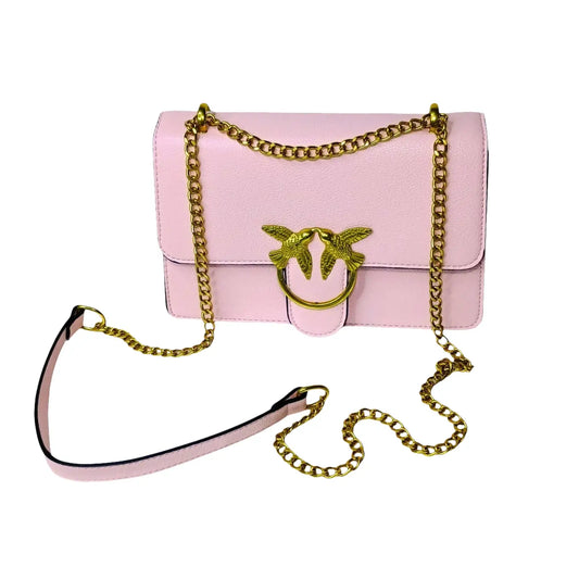 Pink handbag with gold chain strap on a white background